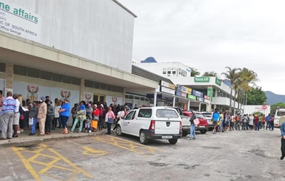 Rain or shine, you'll queue outside at Home Affairs