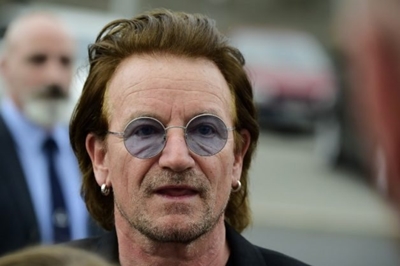 Bono says he’s ‘back to full voice’, U2 tour will resume