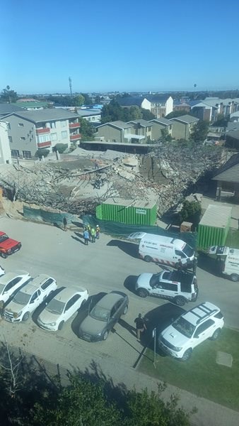 Update: Workers trapped in building rubble