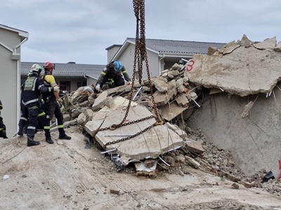 Update on building collapse: 6 more workers trapped under rubble than initially reported