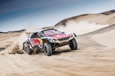 Loeb out of Dakar, Peterhansel forges on