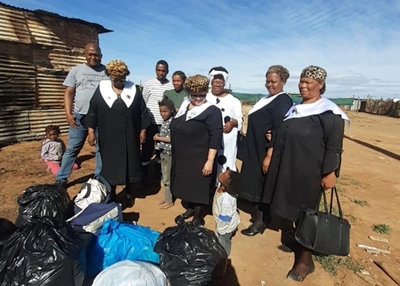 Fire victims get clothing donation