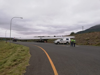Massive wind turbine blade stuck in rock face