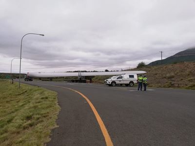 Massive wind turbine blade stuck in rock face