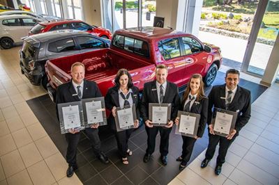 Halfway Toyota employees 'knighted'