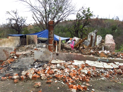Camping on ruins or school for fire victims