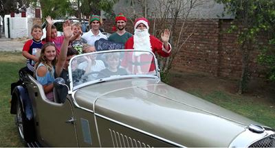Santa surprises local kids with presents