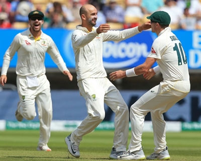 Lyon strikes as Australia press for victory in Ashes opener