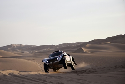 'Mr Dakar' Peterhansel takes third stage as Loeb, Sainz suffer