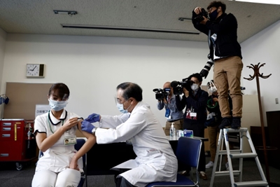 Japan starts vaccine rollout with healthcare workers