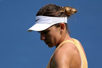 Wimbledon champion Halep battles back in Cincinnati