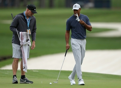Woods over neck problem, ready for Masters