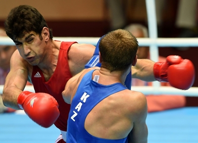 Boxing on the ropes, ducking an Olympic knockout at Asian Games