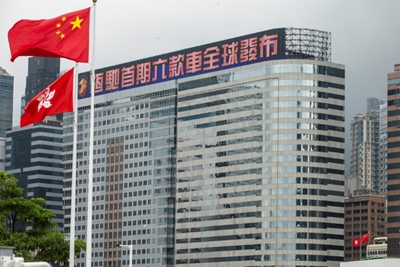 Shares plunge, ratings cut at indebted China developer Evergrande
