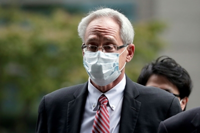 Former Ghosn aide Greg Kelly pleads not guilty as trial opens