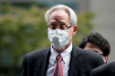 Former Ghosn aide Greg Kelly pleads not guilty as trial opens