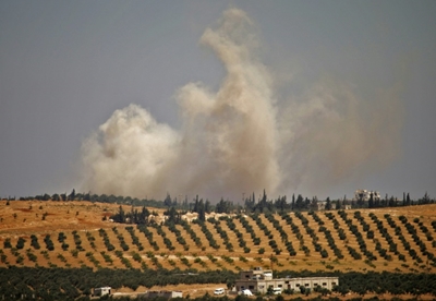 Families flee as regime, Russia pummel Syria's south 