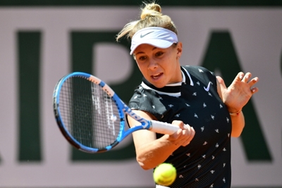 Teenager Anisimova stuns Halep to set up Barty semi-final