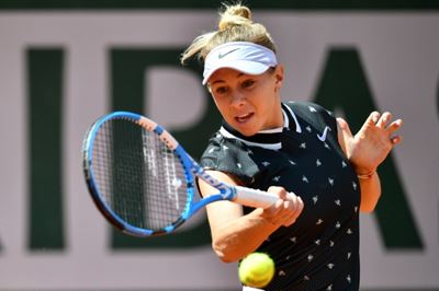 Teenager Anisimova stuns Halep to set up Barty semi-final