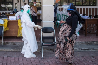 Indonesia virus cases pass 100,000 under 'new normal' policy