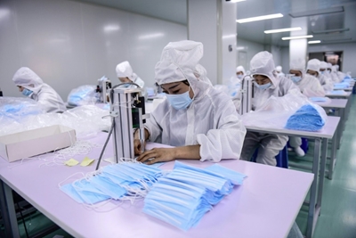China's mask boom takes fabric away for nappy makers