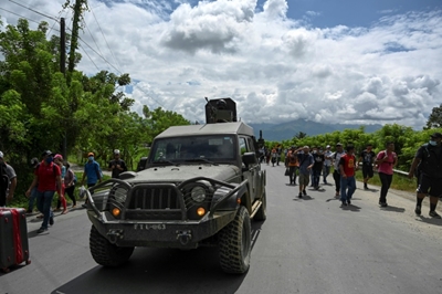 Thousands of US-bound migrants surge into Guatemala 