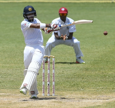 Chandimal denies ball tampering with sweet, rescues Sri Lanka with bat