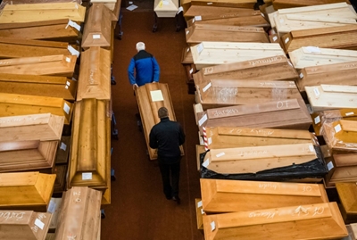 Coffins, fear and desperation: the Covid frontline in 10 pictures
