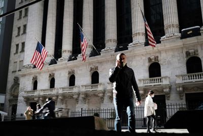 Wall Street retreats from records amid political turmoil