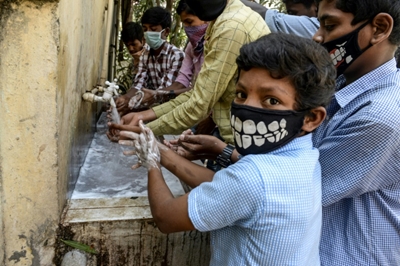 India's Modi to go into virus lockdown for Holi festival