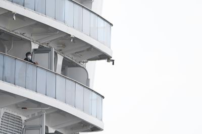 Japan to begin moving some off quarantined cruise ship