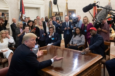 Kanye West loves - and hugs - Trump