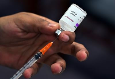 Covid vaccine maker AstraZeneca says 2021 profit dives