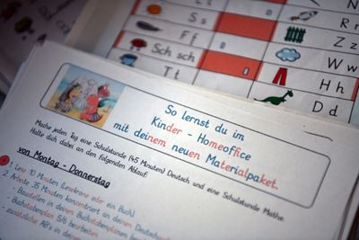 Old school: German great-granddad pitches in with homeschooling