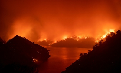 More evacuations as massive fires rapidly expand in California