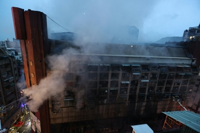 Taiwan building inferno kills 46, dozens injured