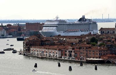 Cruise ships' return to Venice reignites tensions