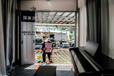 Piano van: Hong Kong music lessons go mobile to beat virus