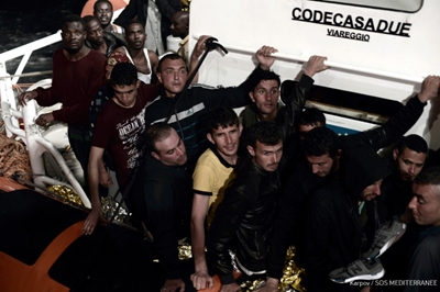 Migrants on stranded rescue vessel to be taken to Spain