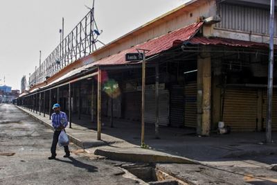 Spread through a market, coronavirus overwhelms Venezuelan oil hub