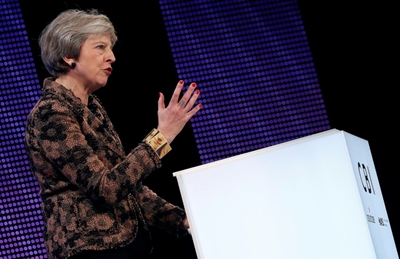 May wins business support for draft Brexit deal