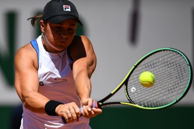 Top seed Barty overcomes scare to reach French Open second round