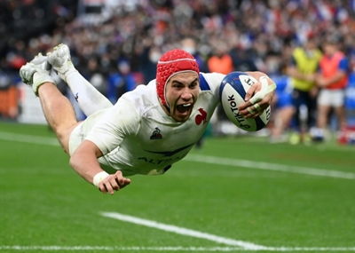 Villiere hat-trick sends France top of Six Nations