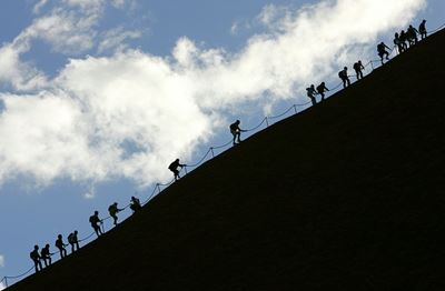 Tourists surge at Uluru before Australia bans climb