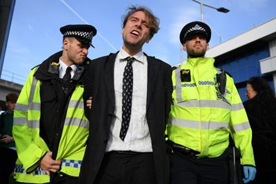 Climate protesters try to 'occupy' London City Airport