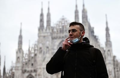 Choked-up Milan takes smoking ban outside