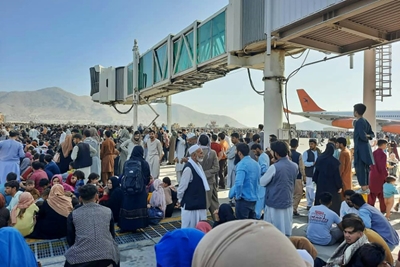 Kabul airport mobbed as Afghans make a desperate dash to exit