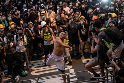 First charges against Hong Kong anti-government protester 