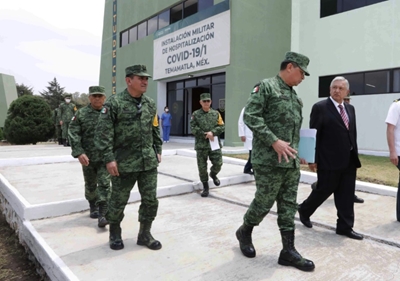 Mexican president says in good health as aide contracts COVID-19