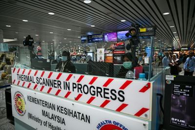 Malaysia imposes ban on Chinese tourists from Wuhan